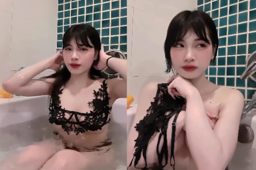 Clip cô gái gợi cảm với đôi môi căng mọng và ánh nhìn đầy khiêu khích